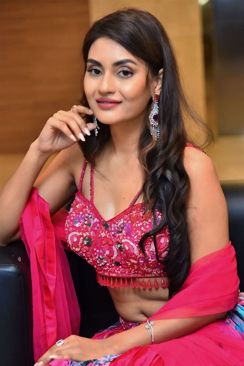 Telugu Girl Garima Chouhan Stills In Red Lehenga Choli